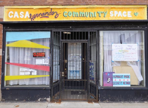 colorful storefront with Casa Hernandez Community Space painted above the entrance